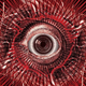 An illustration of a red eyeball surrounded by red veins stares out from the cover of horror anthology Body Shocks.